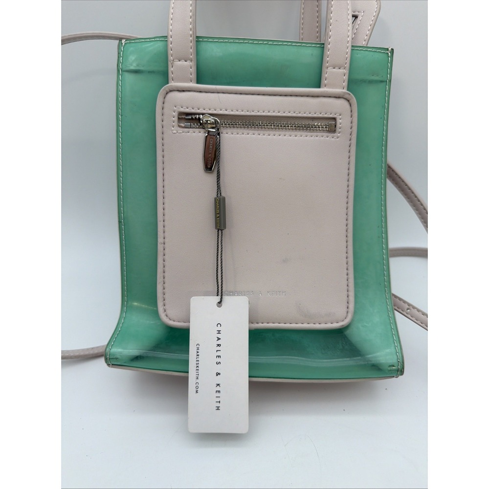 translucent green and cream Charles & Keith transparent tote bag
